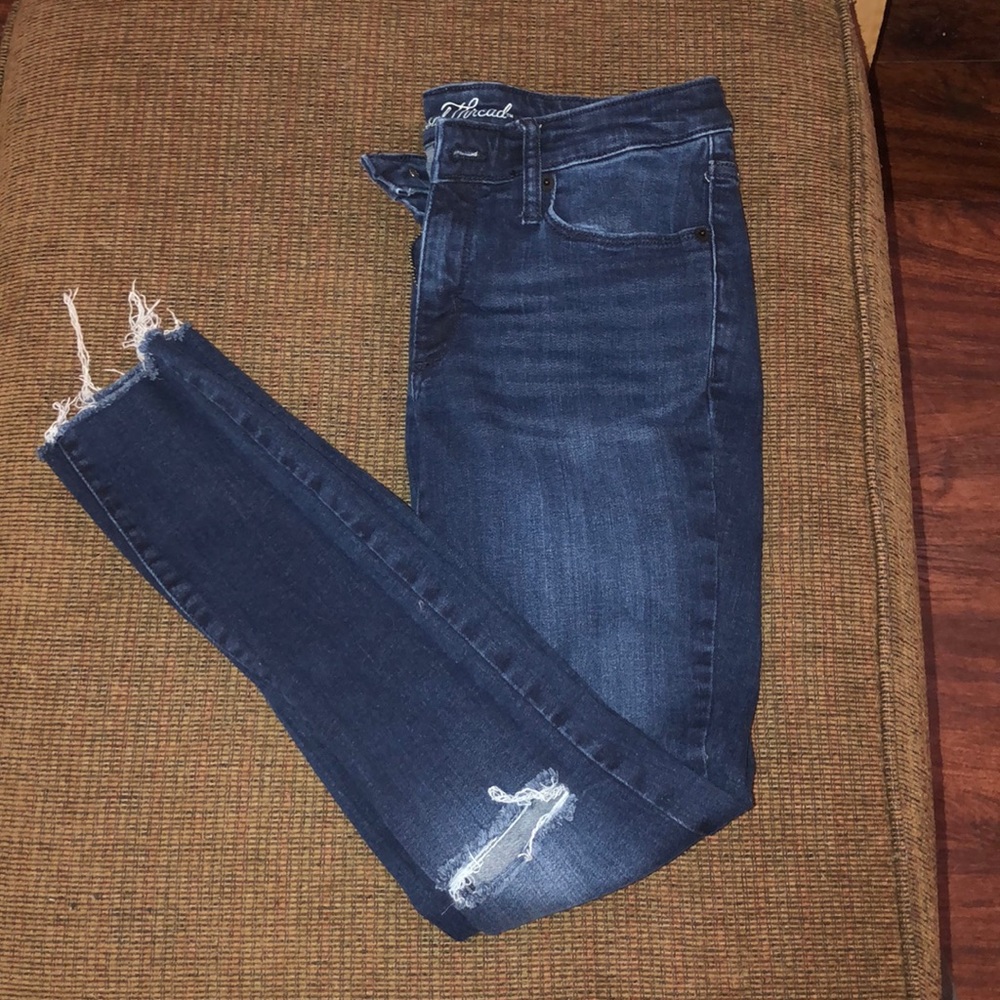 Dark jeans with rips